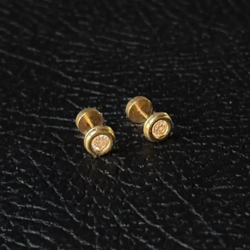 Aros punto de luz oro 18k