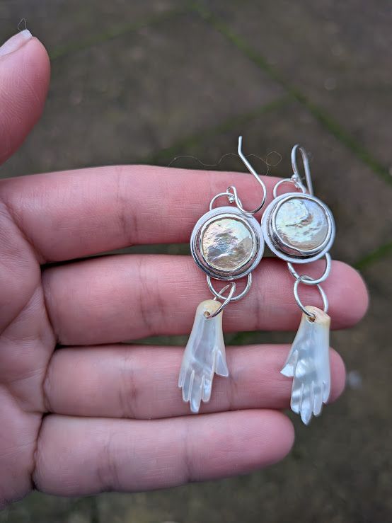 Savage Roots Mona Earrings in Freshwater Pearls with Mother of Pearl Hands