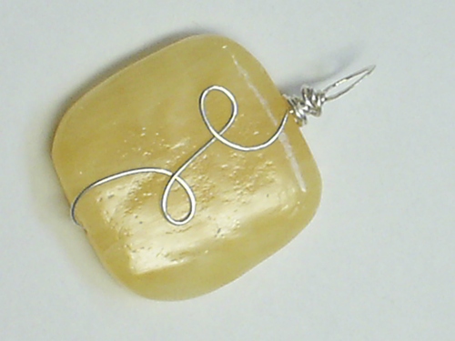 Orange Calcite Twist ~ Tarnish Resistant Silver Base Metal