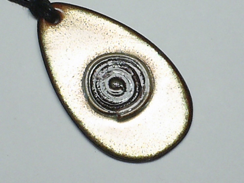 Oval Coppery Iridescent Hints of Greenish Brown Tints Swirl Pendant Necklace on Woven Cotton Cord