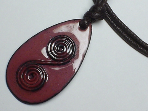 Oval Elongated Double Swirl Pendant Necklace on Woven Cotton Cord