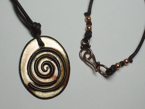 Enameled Copper Swirl Pendant Necklace on Woven Cotton Cord