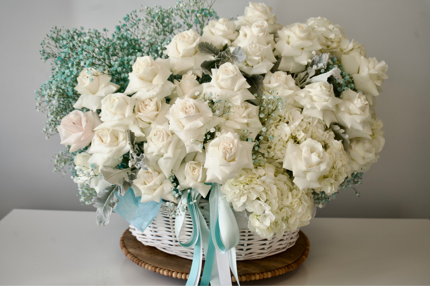 Big Basket Of Roses And Baby Breath