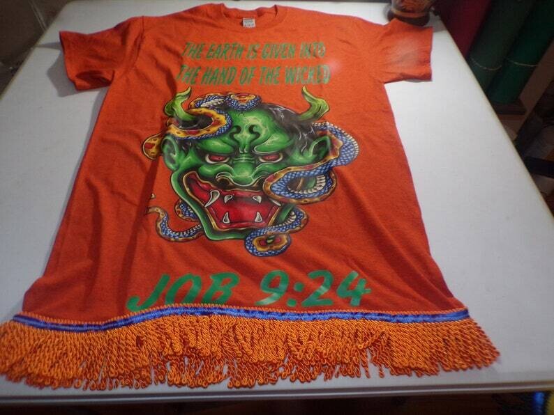 The Earth Is Given To The Hand Of The Wicked Antique Orange