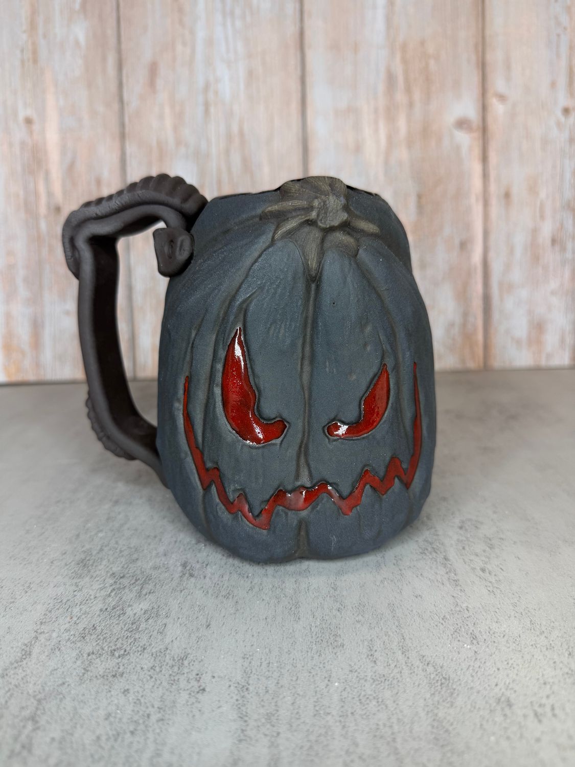 Pumpkin Mug Slate blue skin with Red Eyes