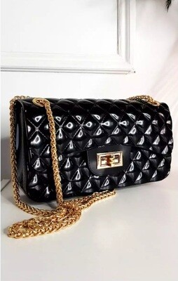 Padded fold over bag with chain strap