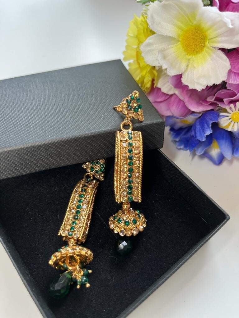 Traditional Gold Jhumka Earrings with Green Stones