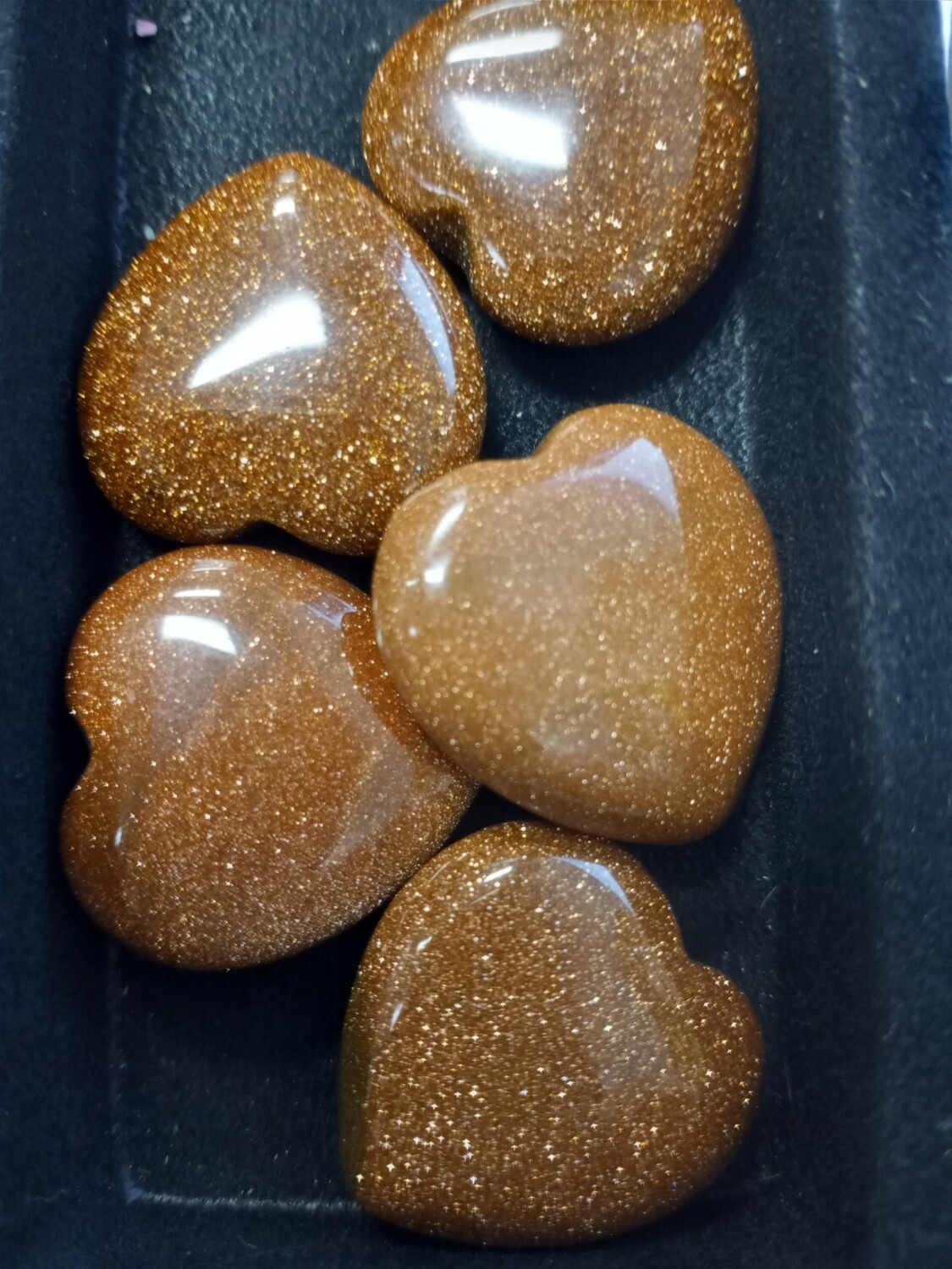 Small red goldstone hearts