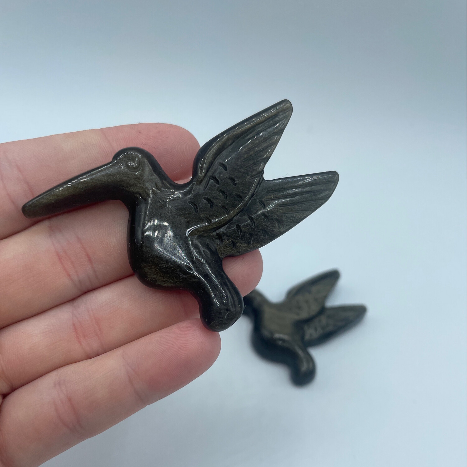 Vogel goldener Obsidian