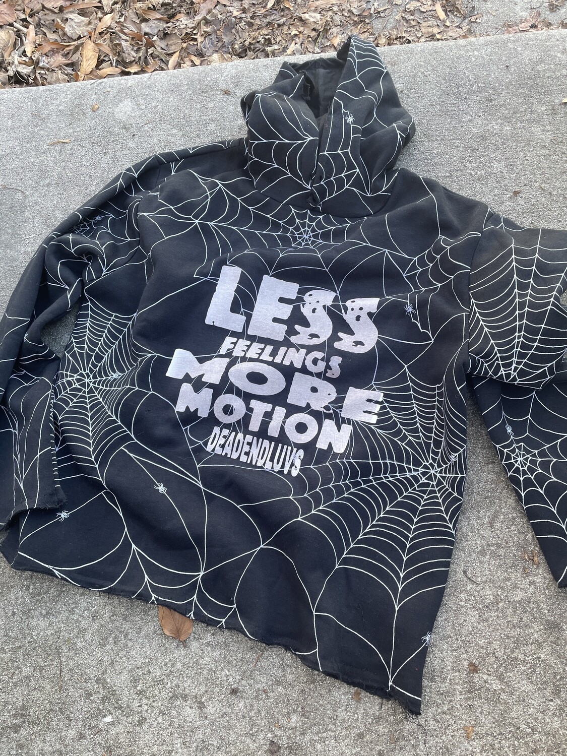 Less feelings more motion spider web hoodie