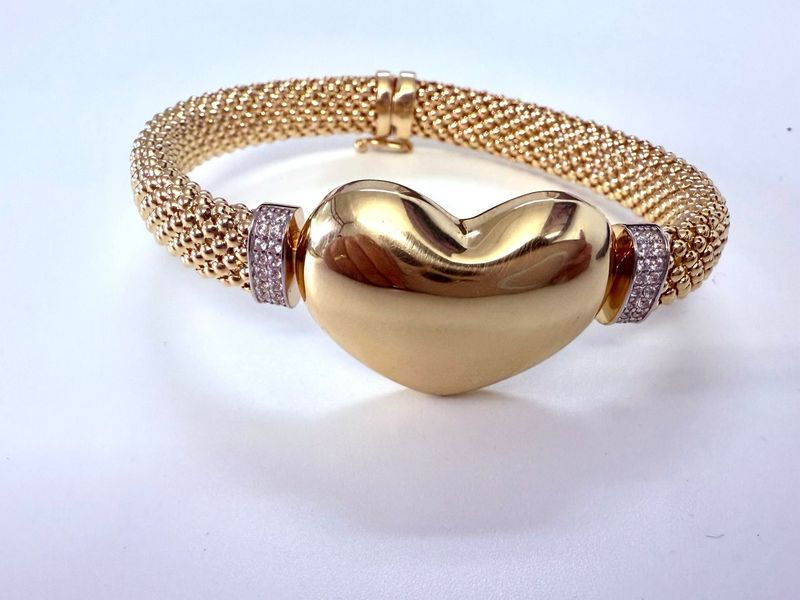 Manilla corazón 14 k