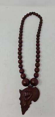 Hand Crafted Rose Wood Fist Pendant