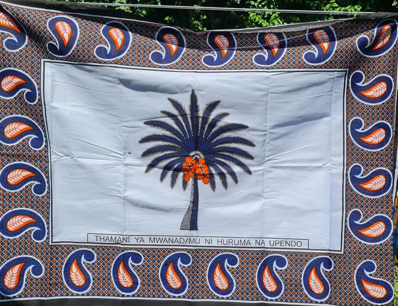 Kanga Collection Fabric - &quot;Thamani ya mwanadamu ni huruma na upendo​&quot; - Amali