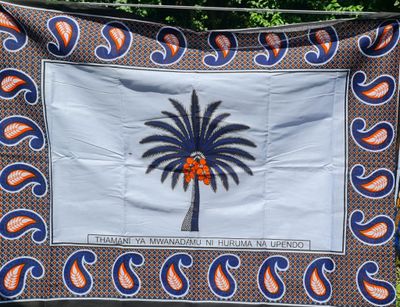 Kanga Collection Fabric - &quot;Thamani ya mwanadamu ni huruma na upendo​&quot; - Amali