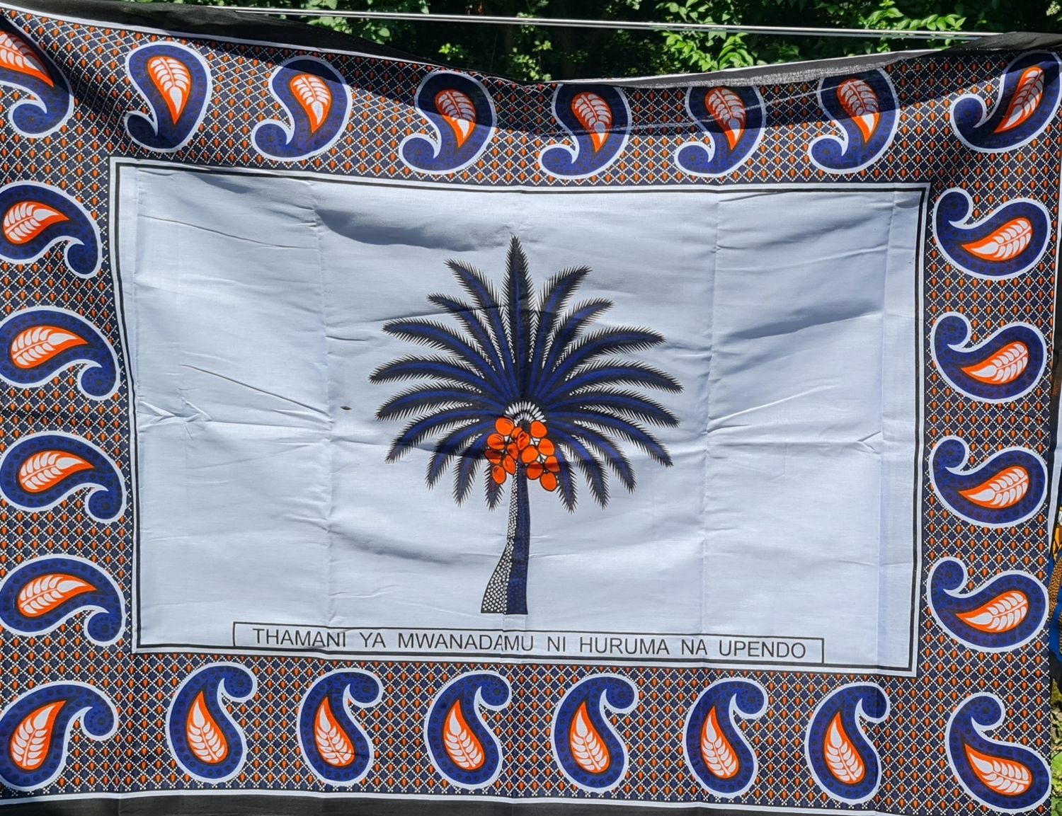 Kanga Collection Fabric - &quot;Thamani ya mwanadamu ni huruma na upendo​&quot; - Amali