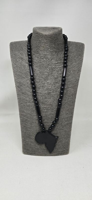 “Hand-Carved Ebony. Beaded with Meaning. Africa at Heart - Mwerani