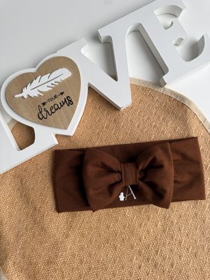 Trak za ušesa z mašnico - kakav