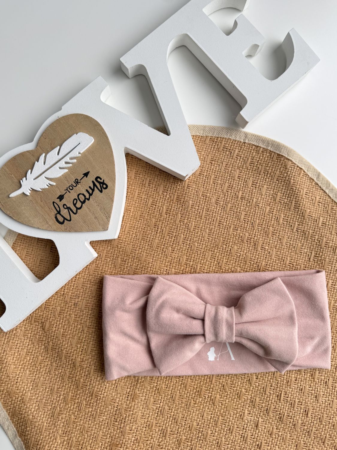 Trak za ušesa z mašnico - puder roza