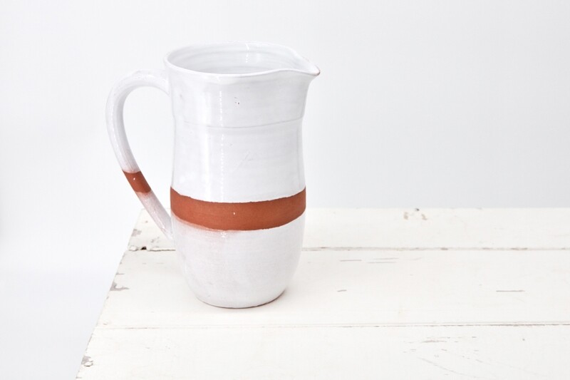 White terracotta jug with 