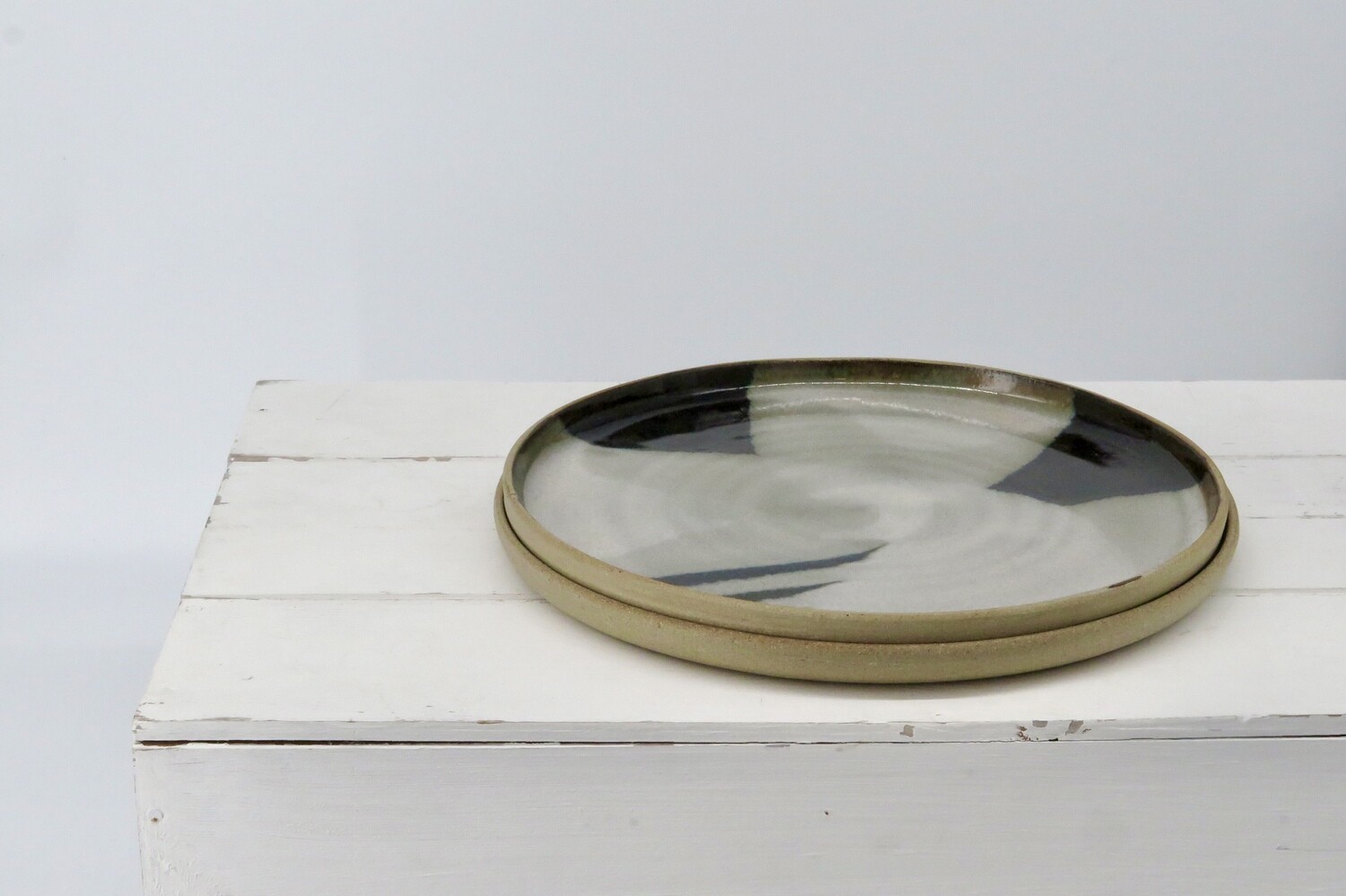Dinner Plate - Black and mottled grey.