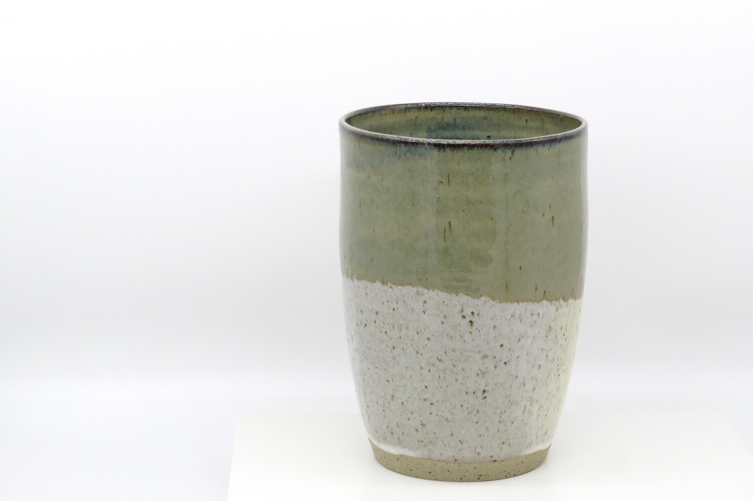 Cylindrical Vase - Flecked white and mottled green.