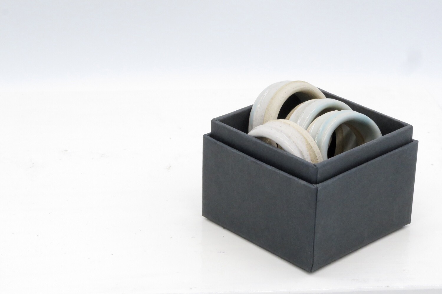 Napkin rings - set of 4 pale green napkin rings in a gift box.