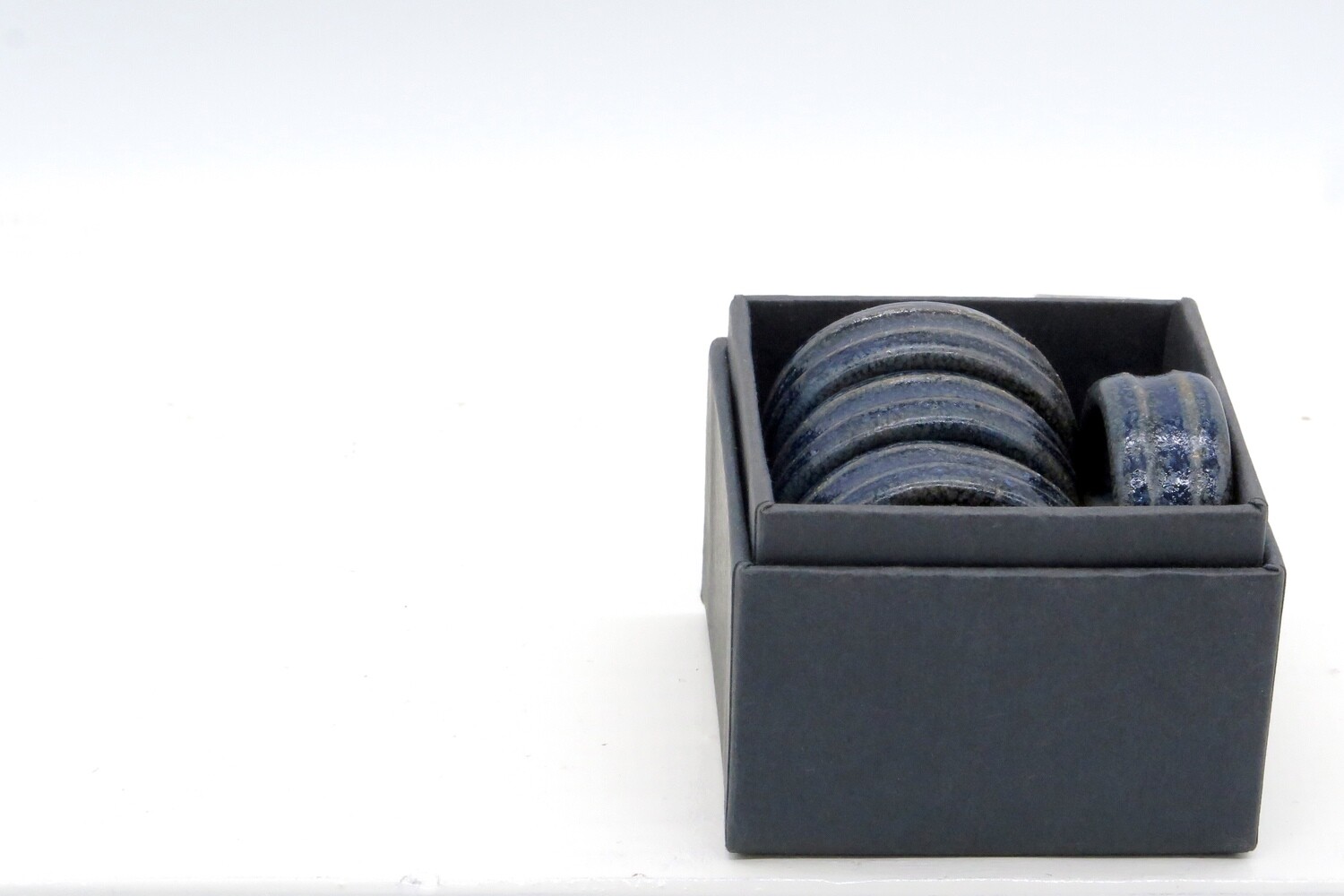 Napkin rings - set of 4 blue napkin rings in a gift box.