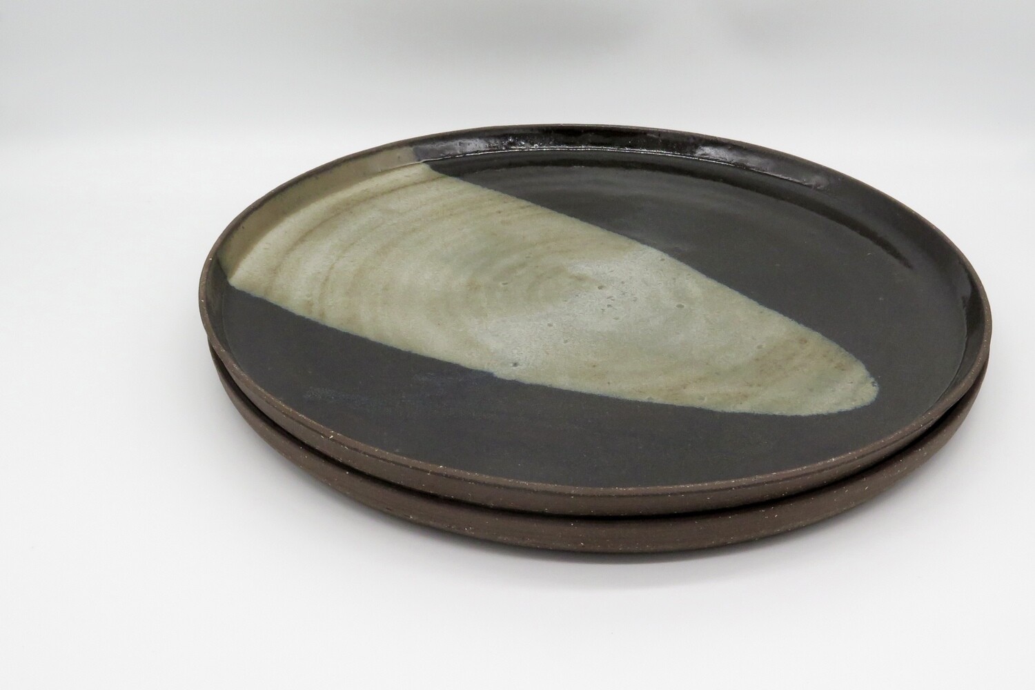 Platter - Black and mottled golden grey serving platter.
