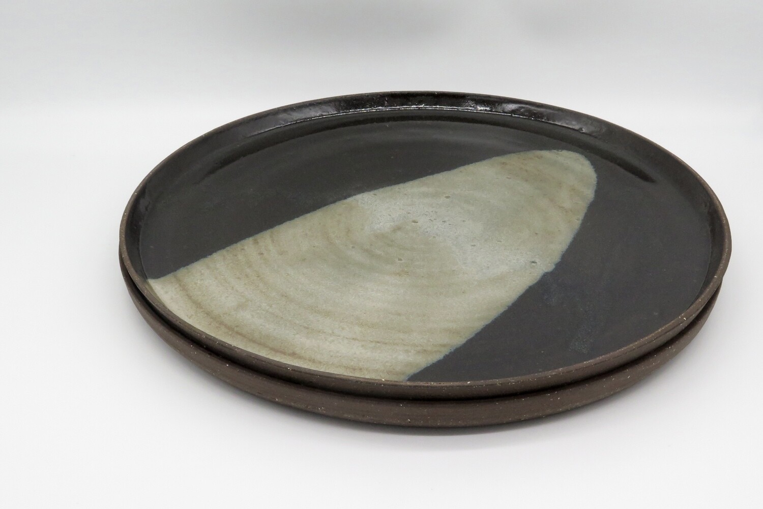 Platter - Black and mottled golden grey serving platter.