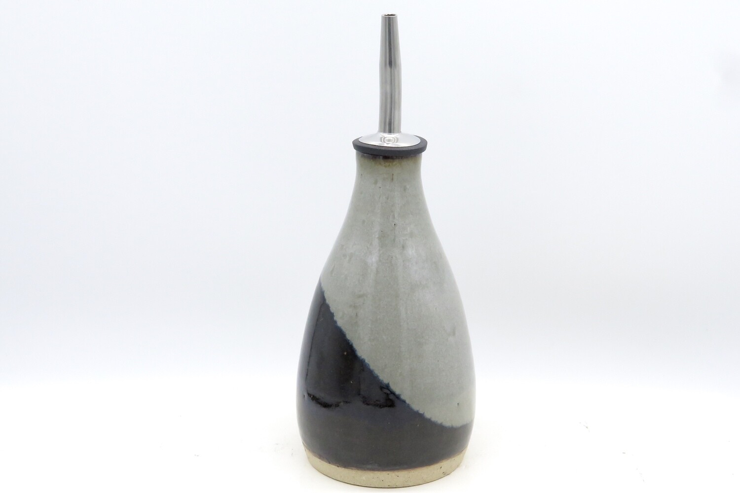 Oil Bottle - Black and mottled grey.