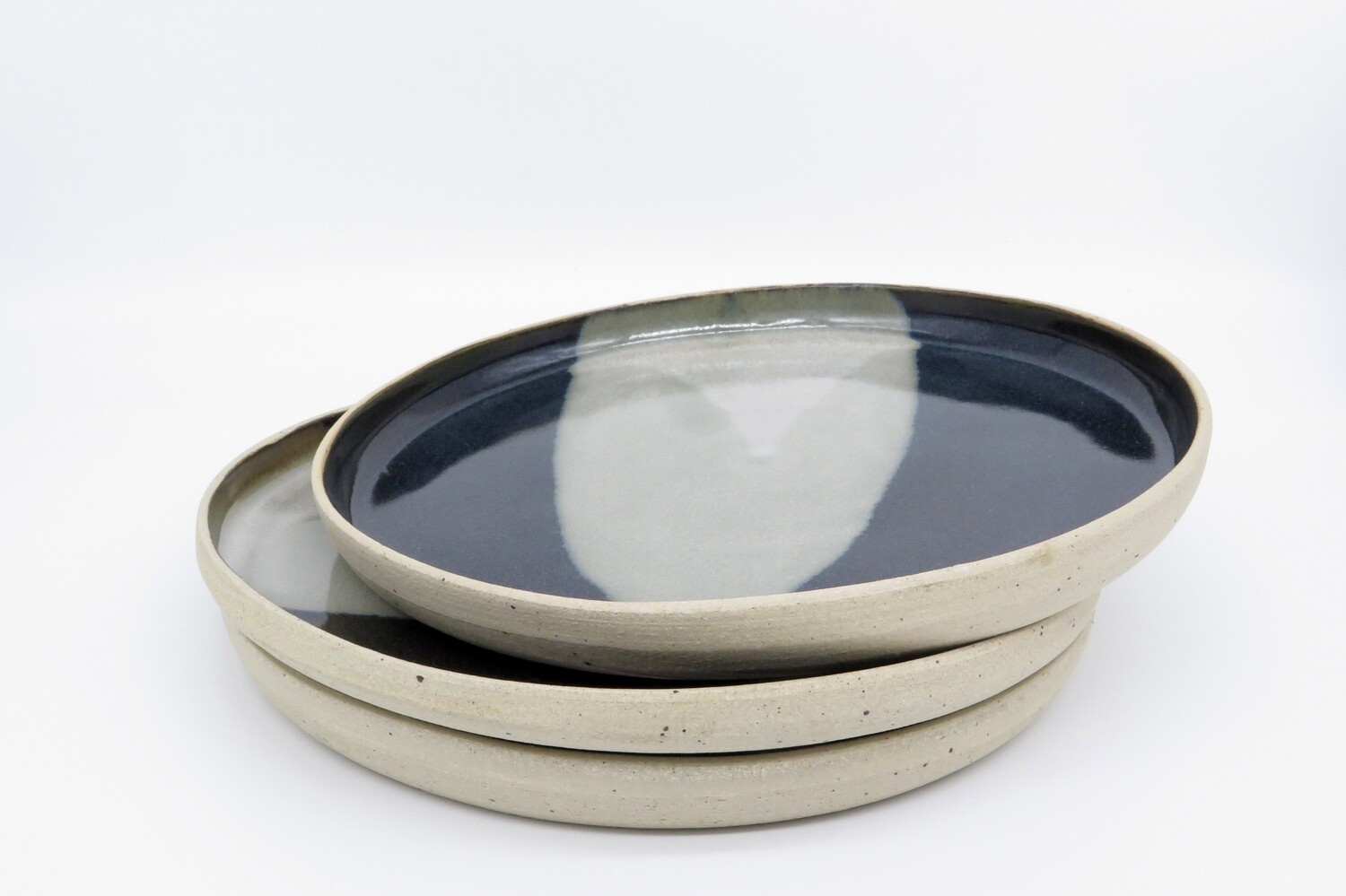 Dinner Plate - Black and mottled grey.