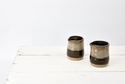 Pourer - Black and mottled grey.