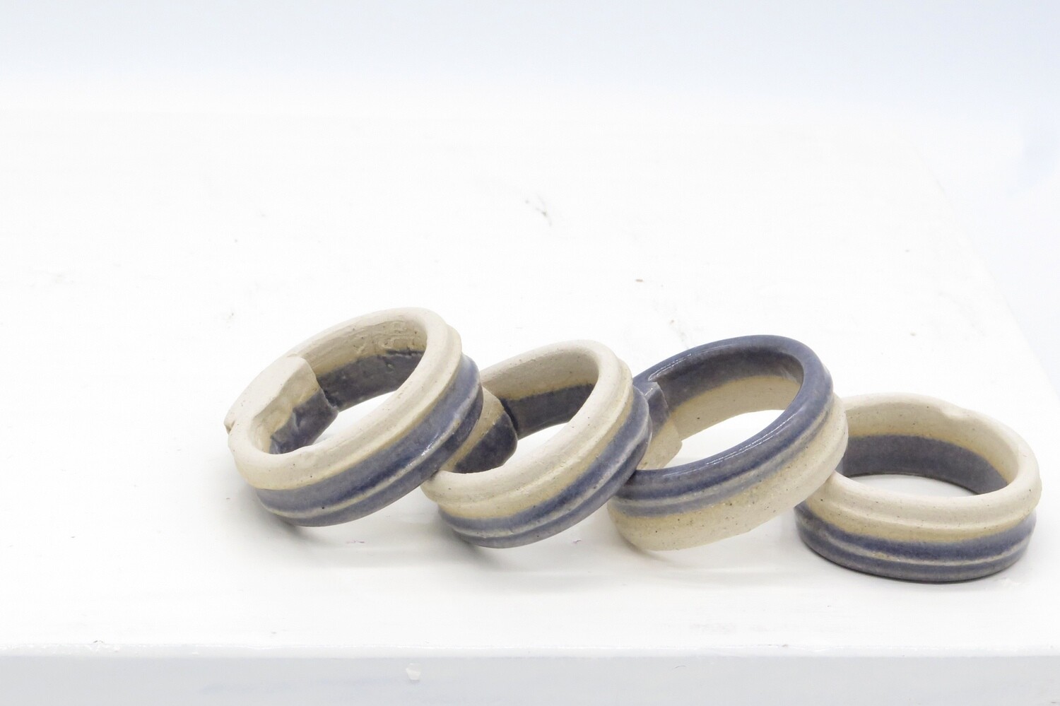 Napkin rings - set of 4 grey napkin rings in a gift box.