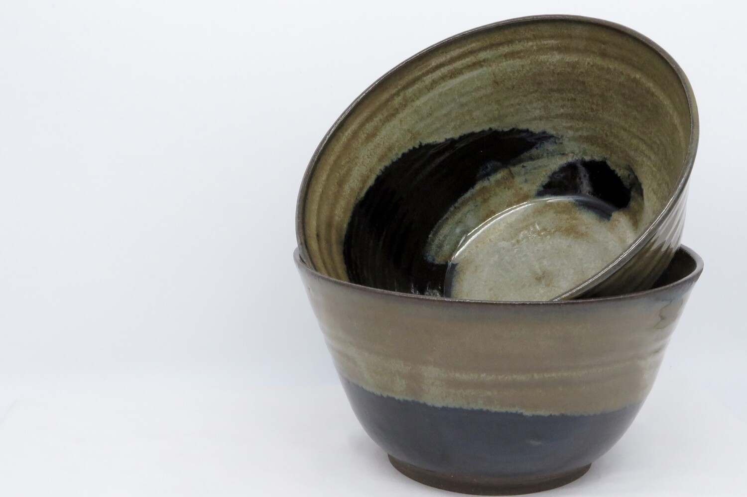 Serving Bowl - Black and mottled golden bronze.