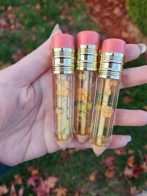 Orange pineapple hydrating lip gloss