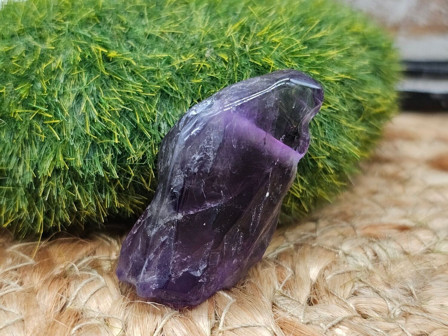 Amethyst Trommelstein gebohrt