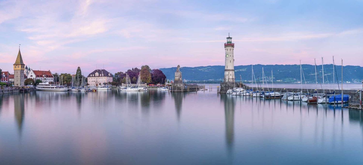 Lindauer Hafen bei Sonnenuntergang – Inspiration für das Bodensee Parfum LINDAU von Bodenseeduft