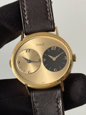 ​PIAGET Dual Time GMT 612501 Oval Champagne Black Arabic Numerals 18k Yellow Gold 33mm Manual Classic Vintage 1978