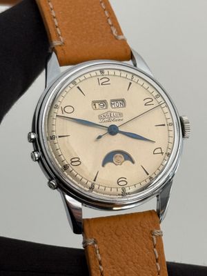 ​ANGELUS Datoluxe Day-Date Moonphase Calendar Stainless Steel Silver Dial Patina 256 Manual 34.5mm Vintage 1948