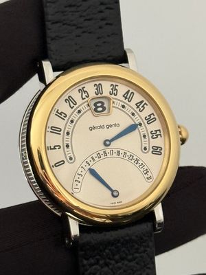 GERALD GENTA Bi-Retro G.3734 Jump Hour Retrograde White Cream 36mm 18k Yellow Gold Stainless Steel Automatic 1999