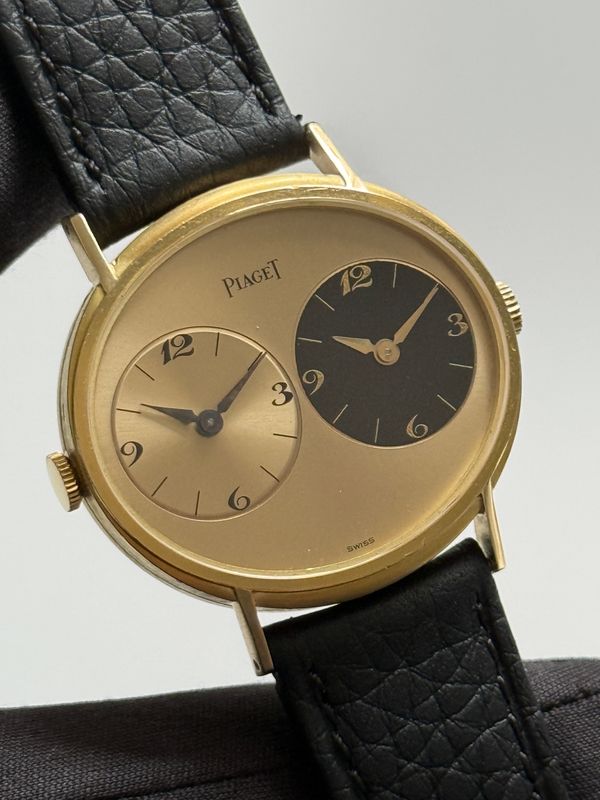 ​PIAGET Dual Time GMT 612501 Oval Champagne Black Arabic Numerals 18k Yellow Gold 33mm Manual Classic Vintage 1978