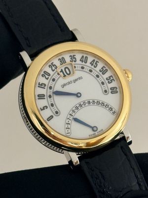 ​GERALD GENTA Bi-Retro G.3714 Jump Hour Retrograde White 34mm 18k Yellow Gold Stainless Steel Automatic 1999
