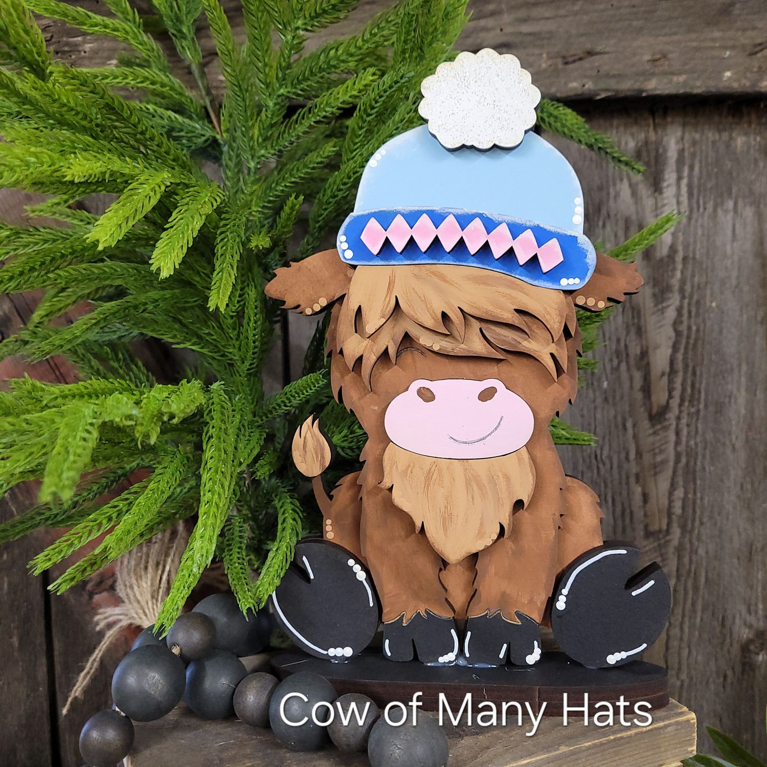 COW OF MANY HATS