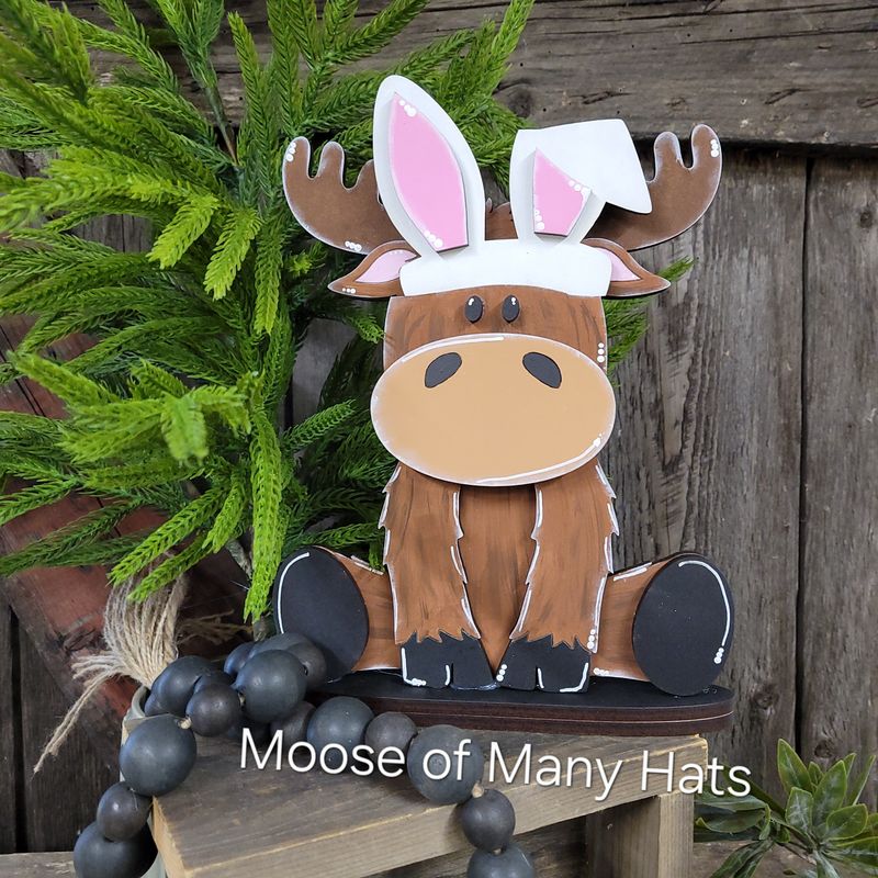 MOOSE OF MANY HATS