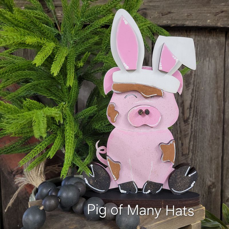 PIG OF MANY HATS