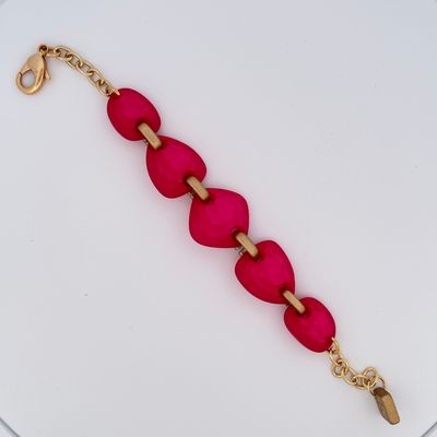 Armband fushia gehamerd