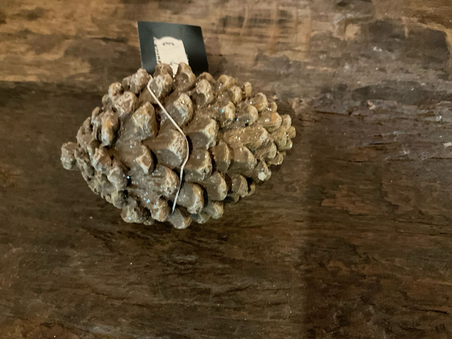 Dennenappel met glitters -20%