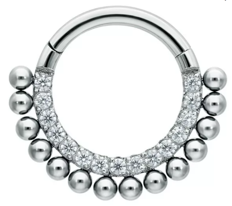 Segmentring/clicker bedekt met zirconia en balletjes Titanium