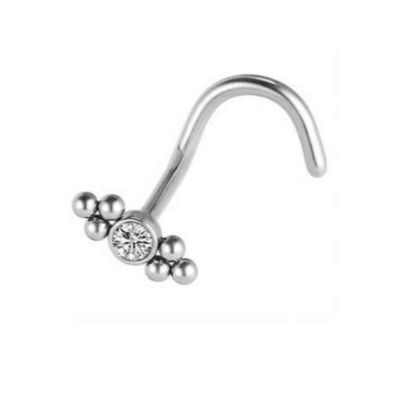 Neuspiercing met bolletjes motief