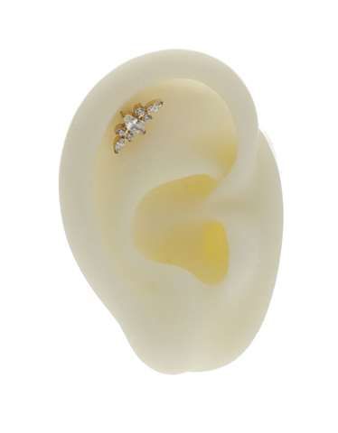 Labret/helix/tragus/flat piercing goud met 7 witte kristallen